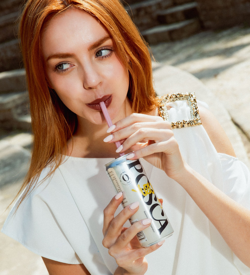 Ancient roman lady drinking a cold Pos