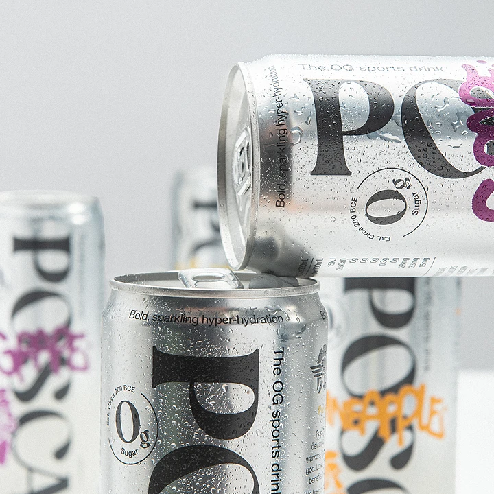 Multiple cans of Popsca Hydrate drinks with visible branding on a light gray background